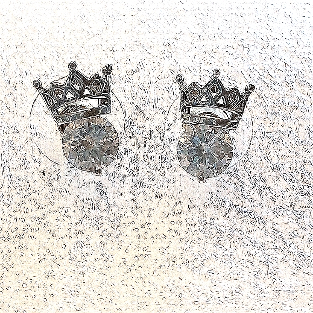 Sterling silver crown cubic zirconia post earrings.